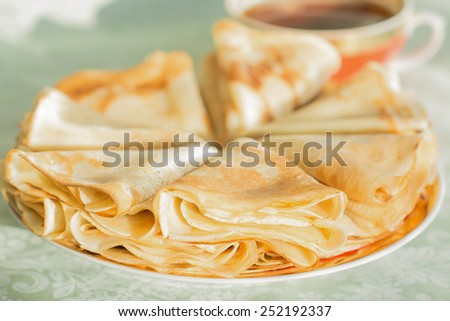 Pancakes - traditional Russian meal at Maslenitsa - Carnival.