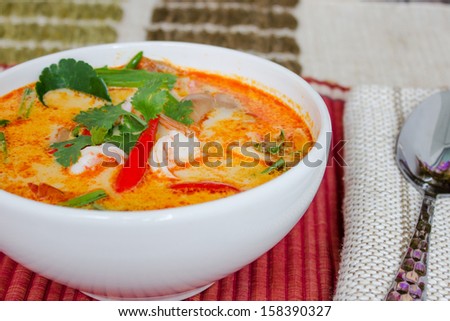 Tom yam kong or Tom yum, Tom yam is a spicy clear soup typical in Thailand and No.1 Thai Dish Cuisine.