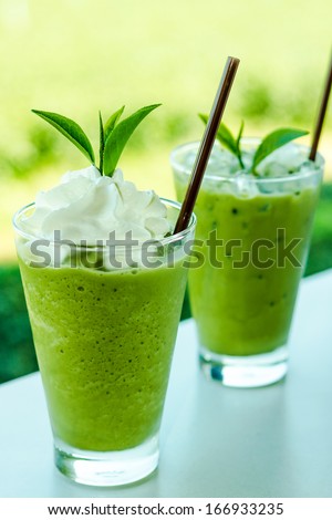 Cup of Green tea smoothies with fresh green tea