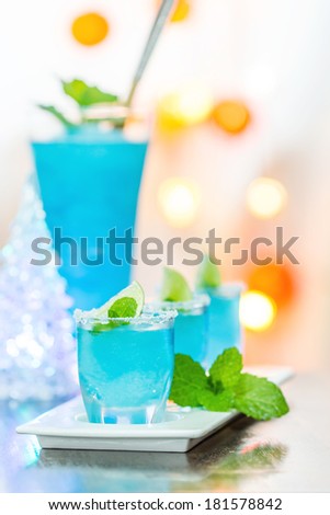Cold Blue Hawaiian cocktail in a night party.