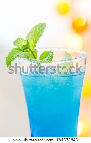 Cold Blue Hawaiian cocktail in a night party.