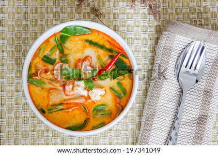 Tom yam kung or Tom yum, Tom yam is a spicy clear soup typical in Thailand and No.1 Thai Dish Cuisine.