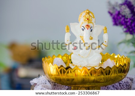 Ganesha Hindu God statue on tray with pedestal