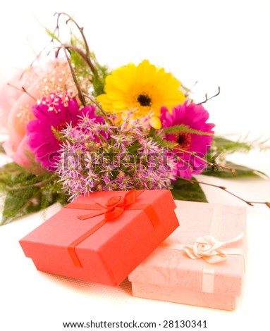 Flowers and present on white