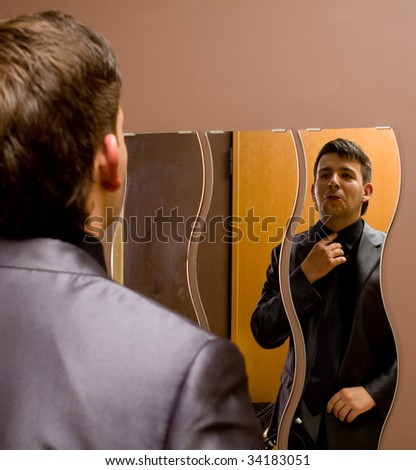Man in the mirror at home