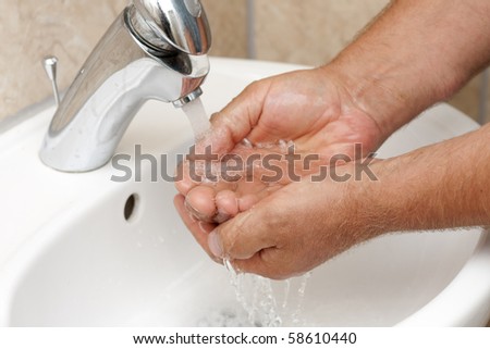 Wash your hands by rinsing them under running water