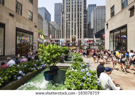 New York City - June 22: Rockefeller Center crowded with tourists in New York on June 22, 2013