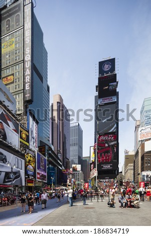New York City - June 22: Chaotic Times Square crowded with people in New York. Taken with a shift lens on June 22, 2013