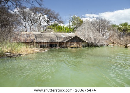 A flooded hotel resort at Lake Baringo in Kenya. Many resorts where destroyed when the lake water level unexpectedly rose by four meters in 2012 and 2013.