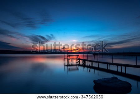 blue hour. Stunning long exposure sunset on the lake.