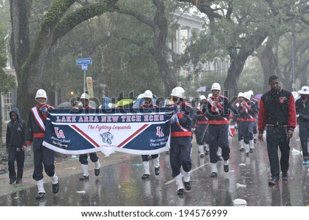 The Lake Area New Tech ECHS marched in a rain filled carnival parade in New Orleans, Louisiana. February 23, 2014.