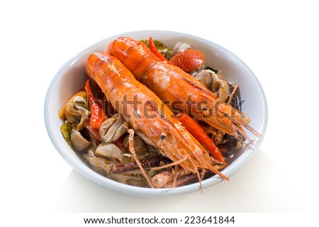 Dry tom yum koong with noodle, Thai food, on white background