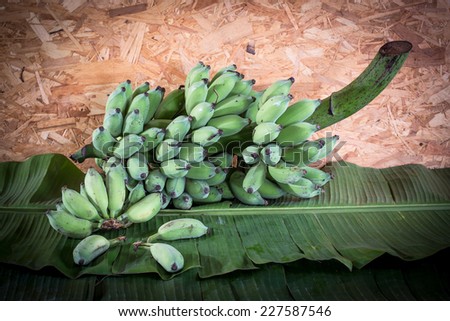 Still Life, Bunch of raw bananas on banana leaves
