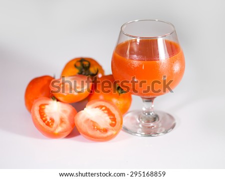 Fresh tomato and tomato juice, blur and Select focus style