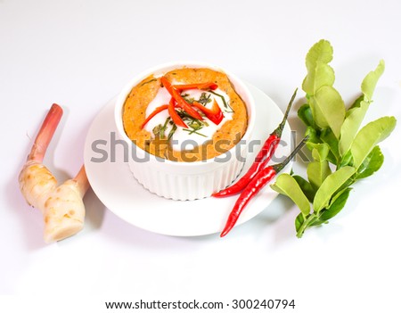 Steamed fish with curry paste in cup, Thai food, (on white background)