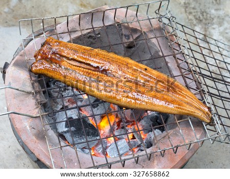 Grill eel (unagi) with sweet sauce on stove, japanese food