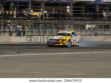 Lvov, Ukraine - June 6, 2015: Unknown rider on the car brand Nissan overcomes the track in the championship of Ukraine drifting in Lvov,Ukraine.
