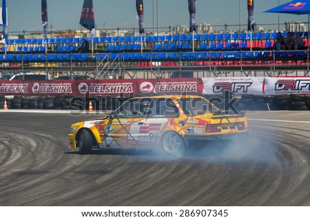 Lvov, Ukraine - June 6, 2015: Unknown rider on the car brand Nissan overcomes the track in the championship of Ukraine drifting in Lvov, Ukraine.
