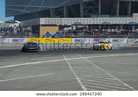 Lvov, Ukraine - June 7, 2015:  Rider Dmytro ILLYUK on the car brand Nissan overcomes the track in the championship of Ukraine drifting in Lvov, Ukraine.