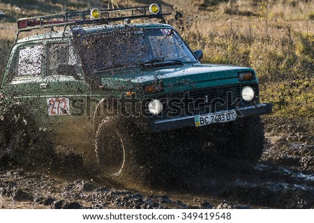 Lviv,Ukraine- December 6, 2015: Unknown rider on the off-road vehicle brand VAZ-NIVA overcomes a route off road at Zub - Trial 2015 near the city of Lviv, Ukraine