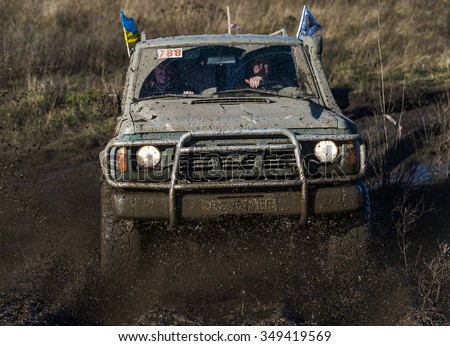 Lviv,Ukraine- December 6, 2015: Unknown rider on the off-road vehicle brand Nissan Patroll overcomes a route off road at Zub - Trial 2015 near the city of Lviv, Ukraine