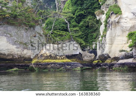 Spectacular coastline in Matsushima, traditionally regarded as one of the three best sights in Japan, beautifully shaped rocks covered with pines.