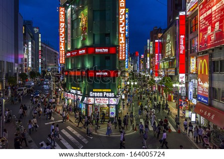 Tokyo, Japan - June 26, 2010: The Brigtly Lit Streets In East Shinjuku On 26 June 2010 In Tokyo, Japan. East Shinjuku Is One Of The Most Important Entertainment District And Meeting Places In Tokyo.