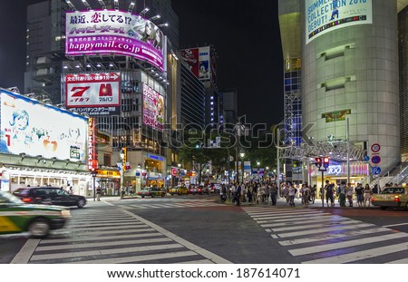 Tokyo, Japan - June 28, 2010: Brightly lit streets and crowds of people in Shibuya district on 28 June 2010 . Shibuya is probably the best known meeting place in Tokyo.