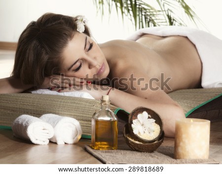 Beautiful Woman Getting Spa Massage in Spa Salon.