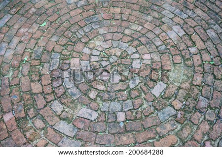 Old Red Brick Road Surface Shaped in a Circle