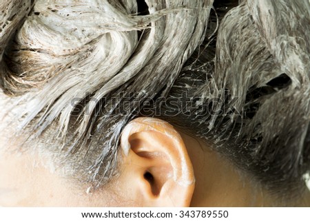 The process of hair coloring,hair coloring,Hair Colouring in process,Woman gets new hair colour,Hair Colouring in process