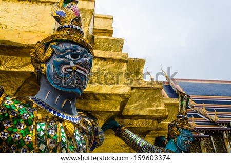 The demon statue supporting golden pagoda at Temple of the Emera