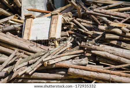 messy pile of wood at construction site