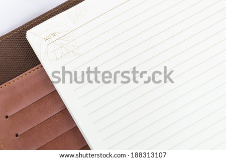 brown notebook with blank brown page