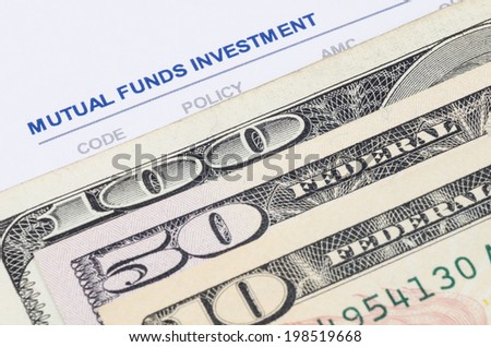 us dollar banknote on the mutual funds investment