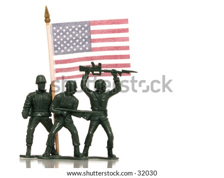 Green army men holding a US Flag on white with reflection.