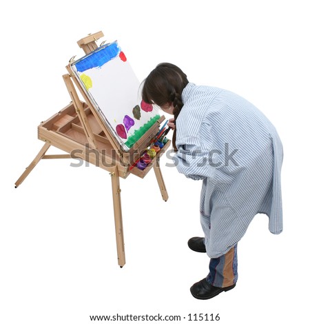 Adorable grade school aged girl painting.