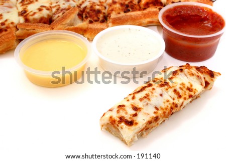 Take cheese pizza sticks with a container of marinara sauce, ranch dressing and garlic butter.