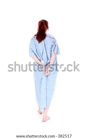 Backside Of Woman Holding Hospital Gown Closed.