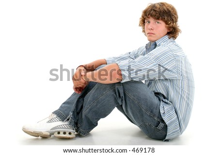  Attractive Sixteen Year Old Teen Boy In Casual Clothes Over White. Light