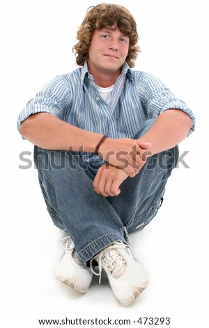 stock photo : Attractive Sixteen Year Old Teen Boy in casual over white 