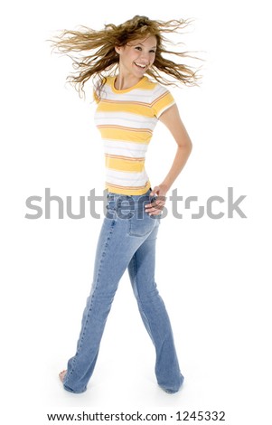 stock photo Beautiful teen girl barefoot in jeans and yellow sriped shirt