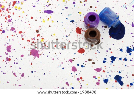 Jars of paint on floor; purple, blue, brown.