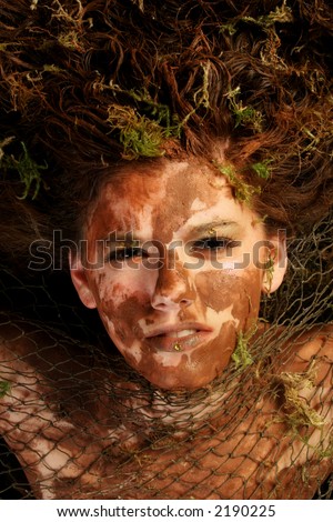 mud covered teen fish swamp wrapped creature shutterstock