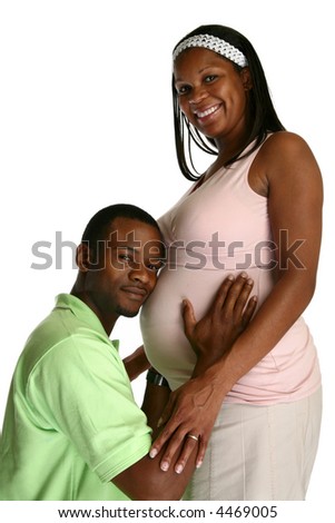 Attractive African American expecting parents over white background.