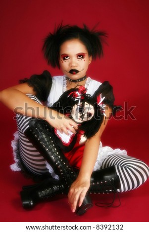 stock photo Beautiful young Indonesian woman dressed as anime goth doll