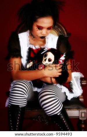 stock photo Beautiful young Indonesian woman dressed as anime goth doll