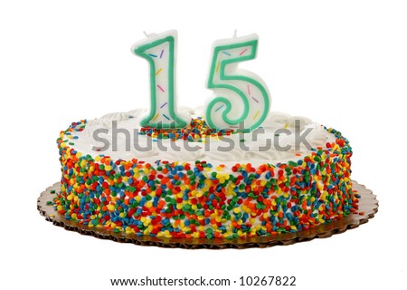  sprinkle covered anniversary or birthday cake with number 15 candles on