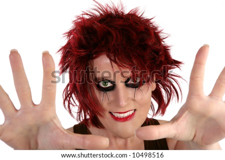 stock photo : Forty something redhead woman dressed in goth make-up and hair 