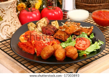 Stuffed mushrooms, fried ravioli, oven baked potatoes, marinara, honey mustard, ranch dressing, Cheese Manicotti, salad.
